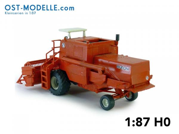 Mähdrescher BIZON Z056 mit Sonnendach 5m Schneidwerk und Transportwagen rot